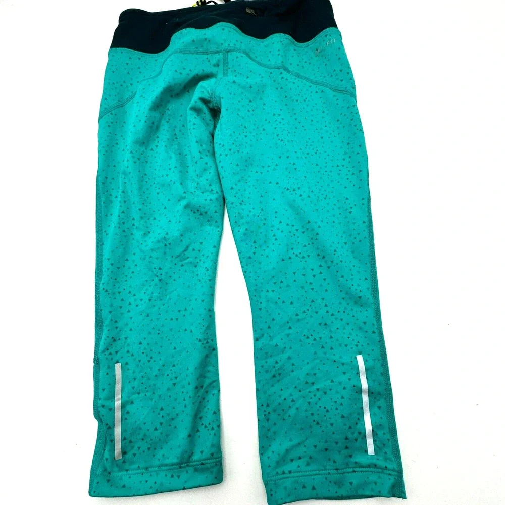 NIKE Women's XS Teal Epic Lux Tight Fit Running Capri Pants‎ Leggings zip Pocket
